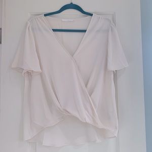 Cream colored high-low blouse